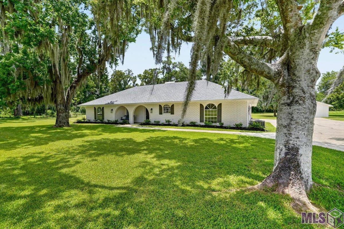 10413 Stringer Bridge Road, St. Amant, LA 70774 — photo 2
