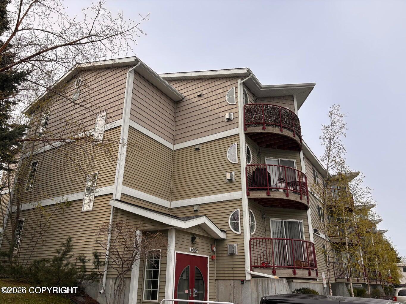6109 Debarr Road #C209 — photo