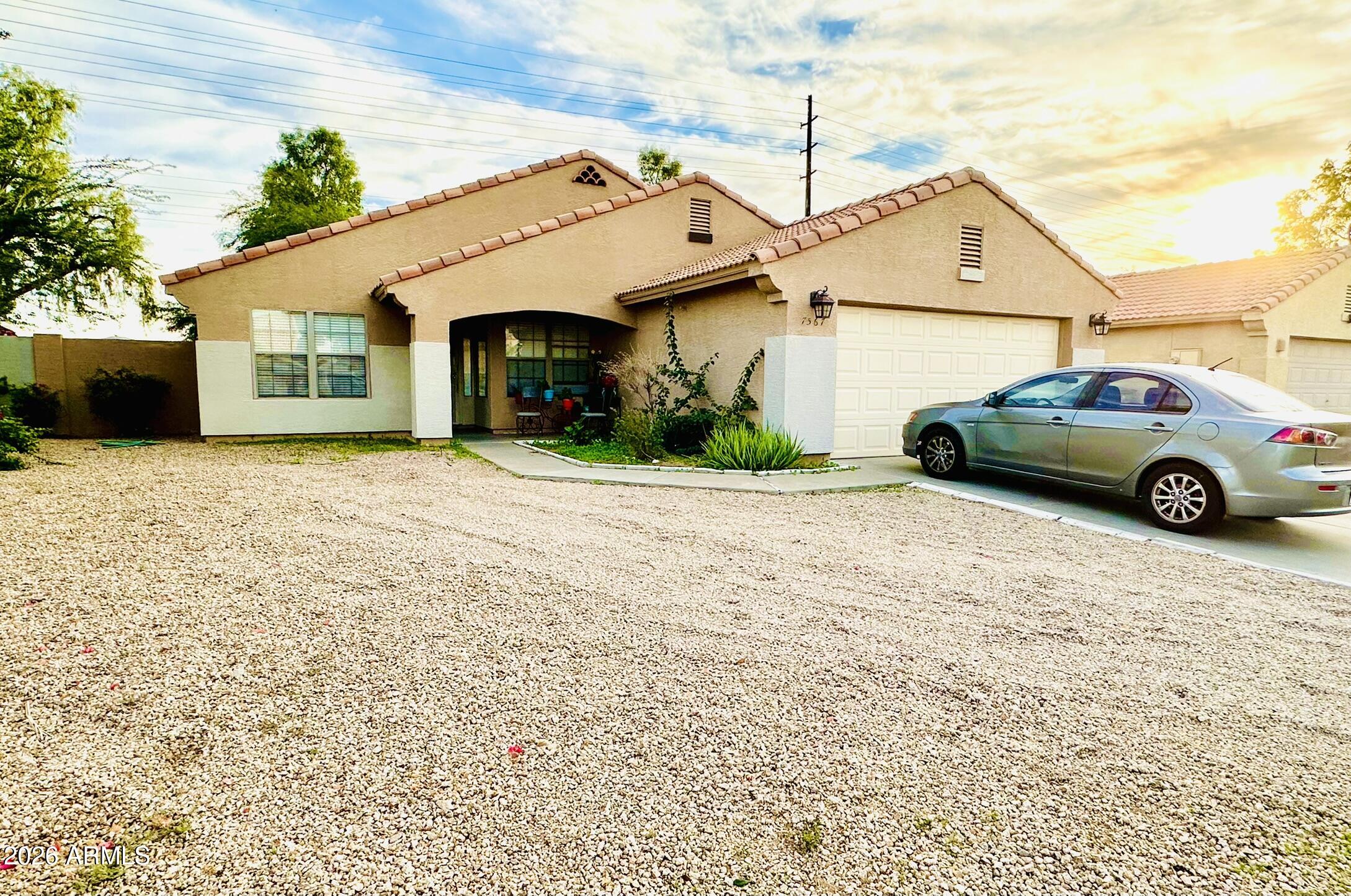 7567 W Pasadena Avenue — photo