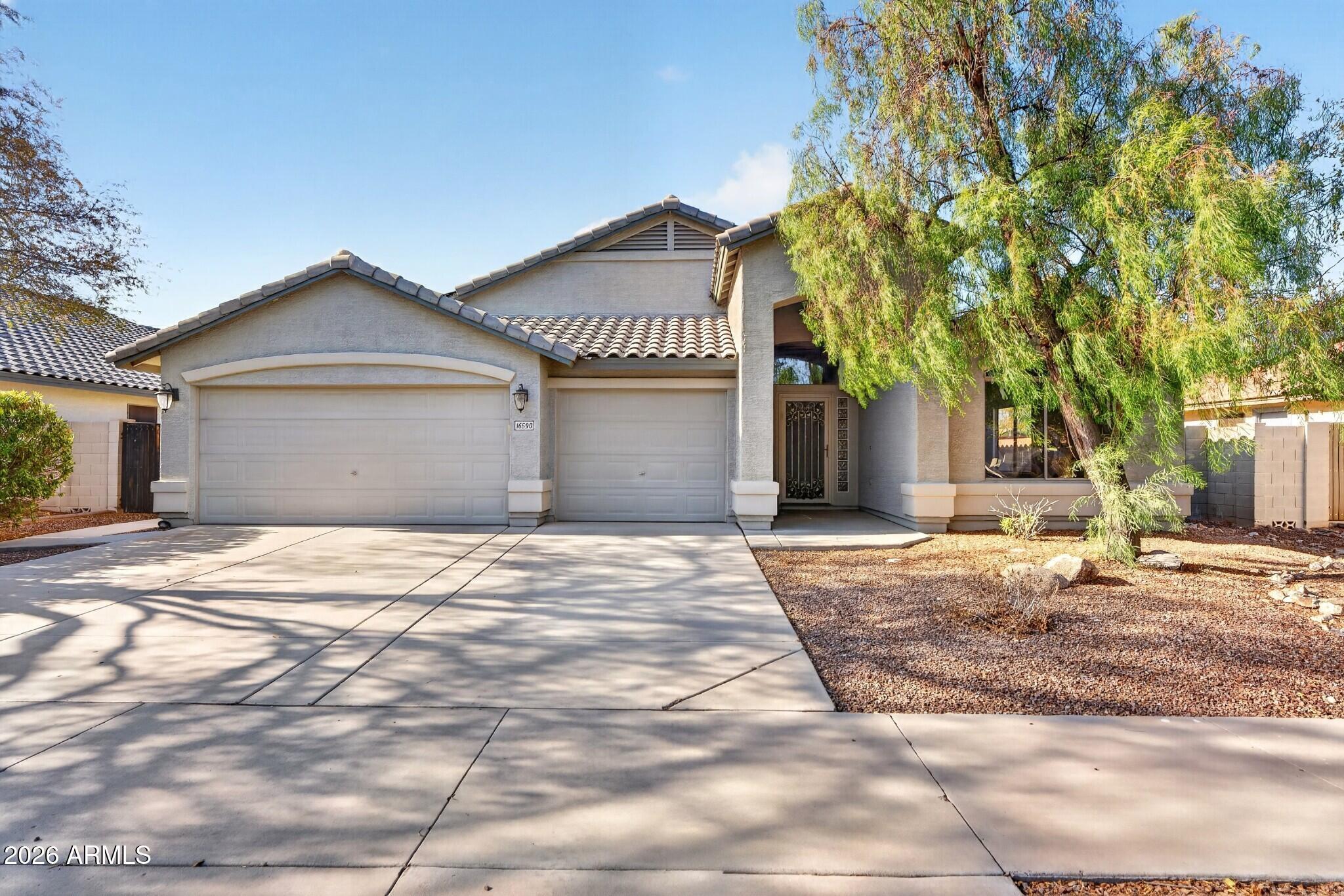 16590 W Woodlands Avenue — photo