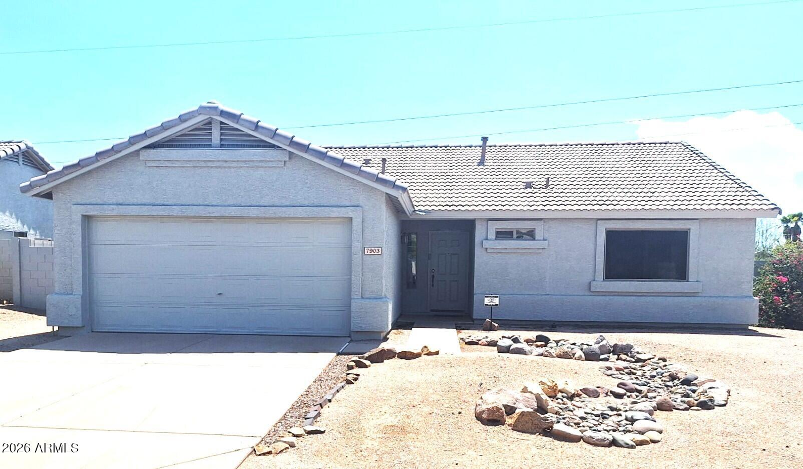 7903 E Covina Street — photo