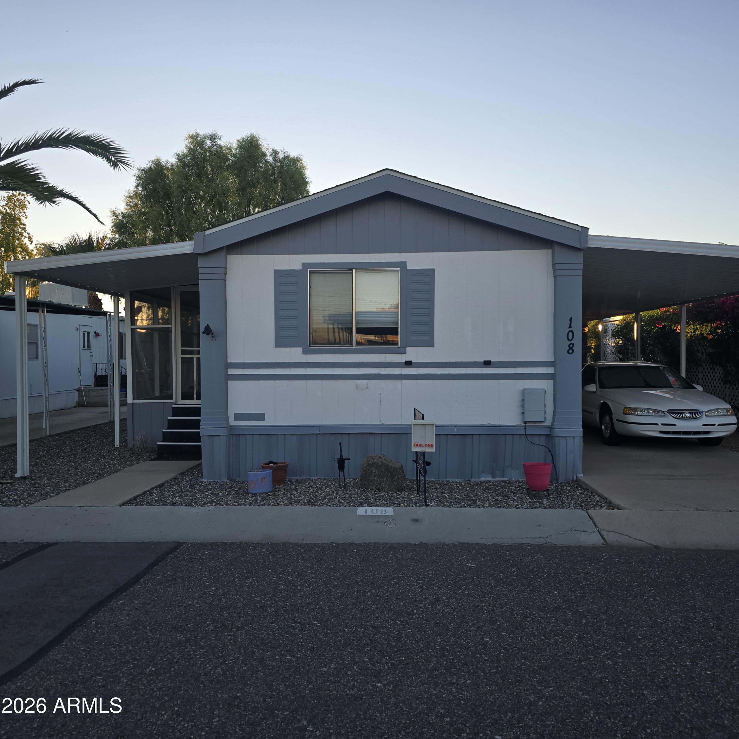 6942 W Olive Avenue Unit 108 — photo