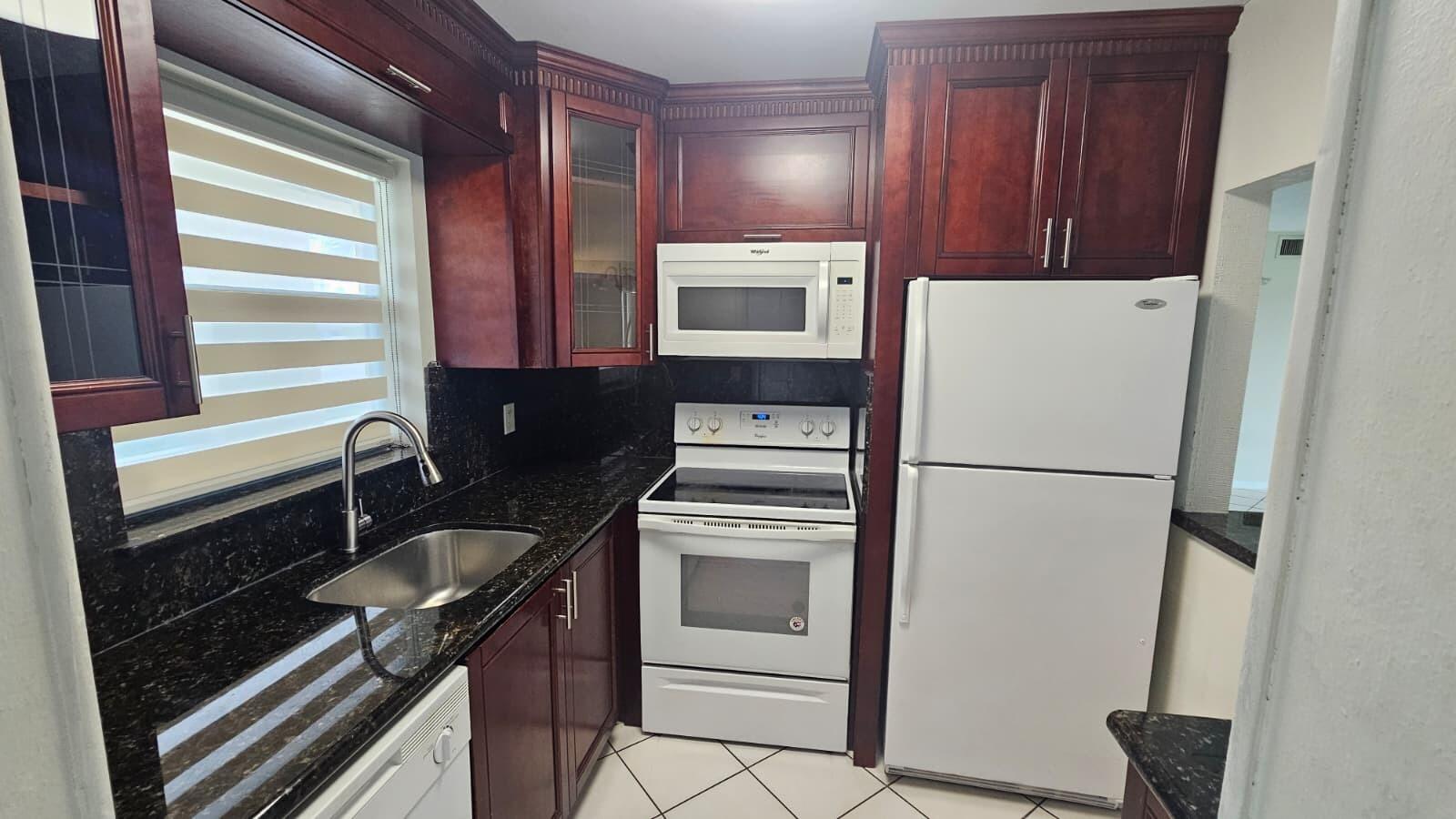 9911 Sandalfoot Boulevard 116 — photo
