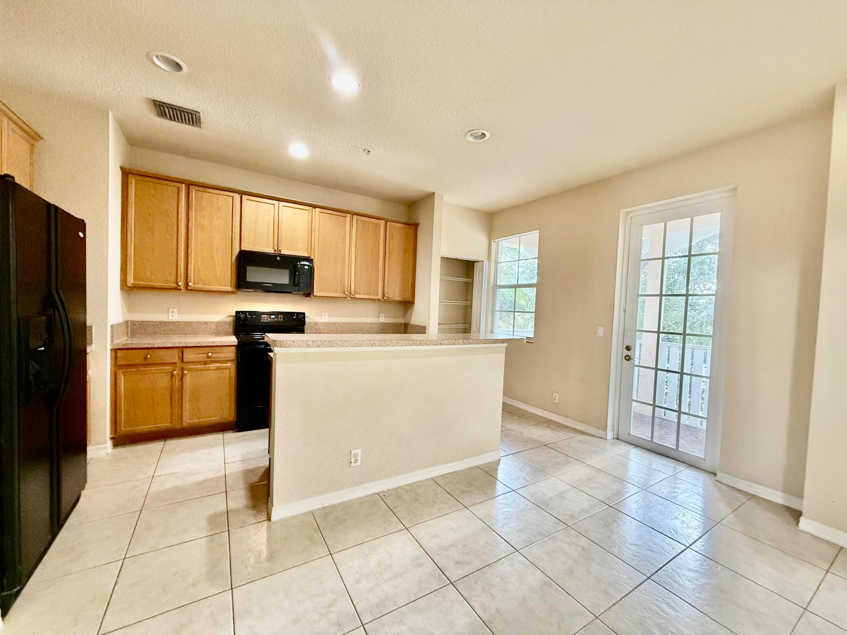 335 E Thatch Palm Circle #104, Jupiter, FL 33458 — photo 3