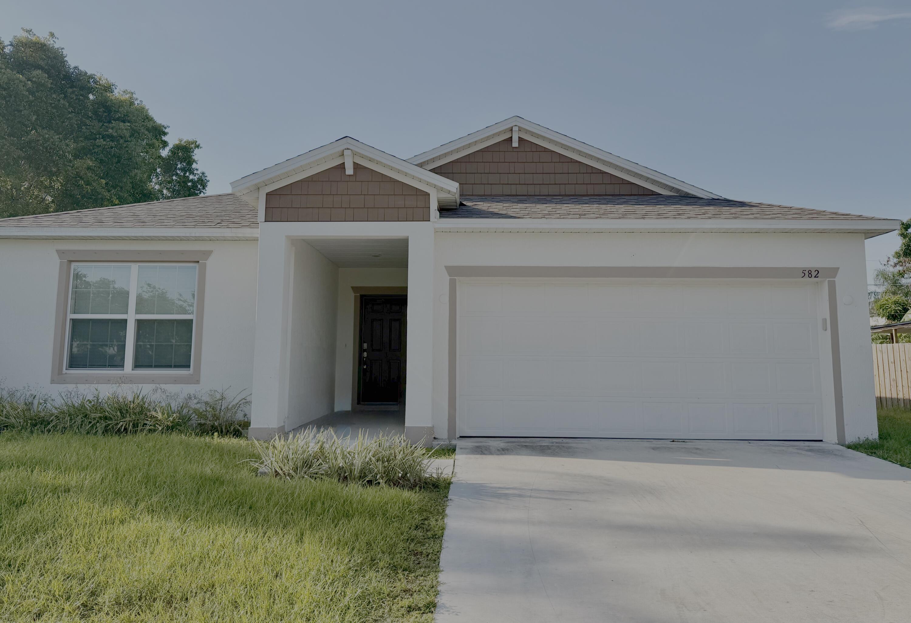 582 SW Sea Holly Terrace — photo