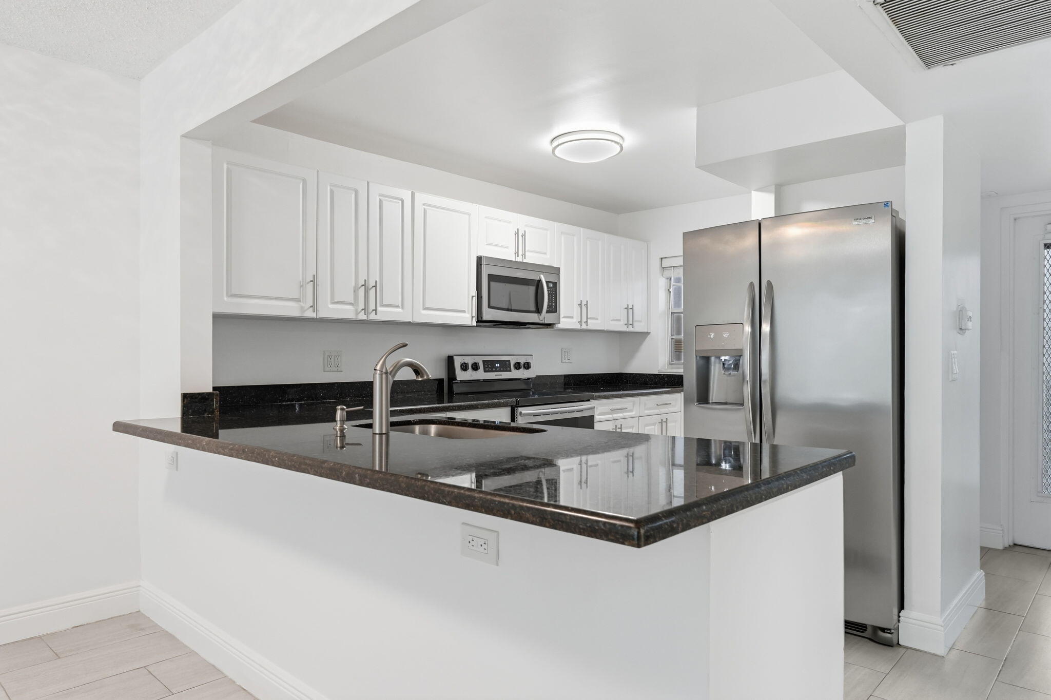 9325 Lagoon Place 405 — photo