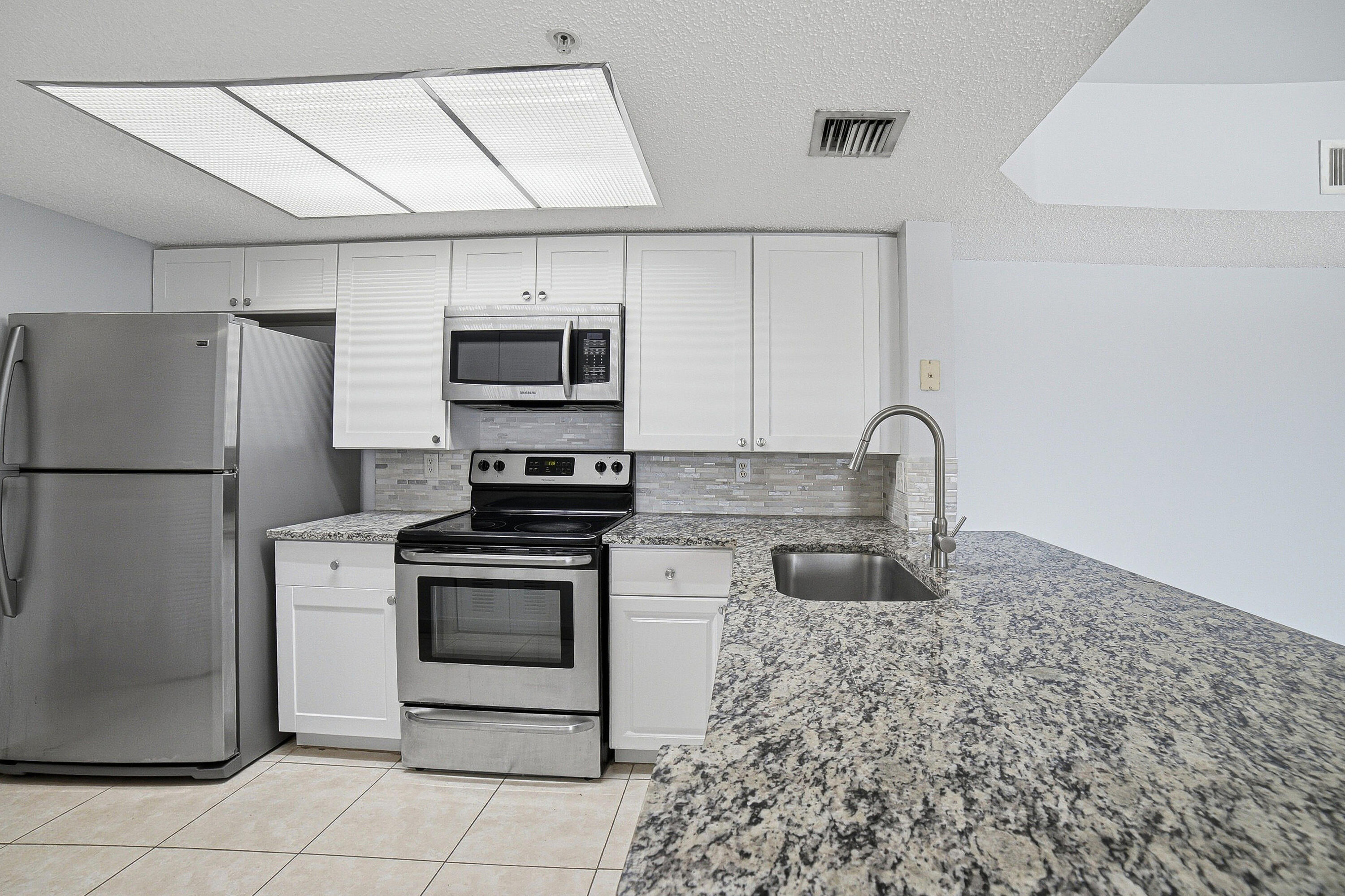 5045 Wiles Road 308 — photo