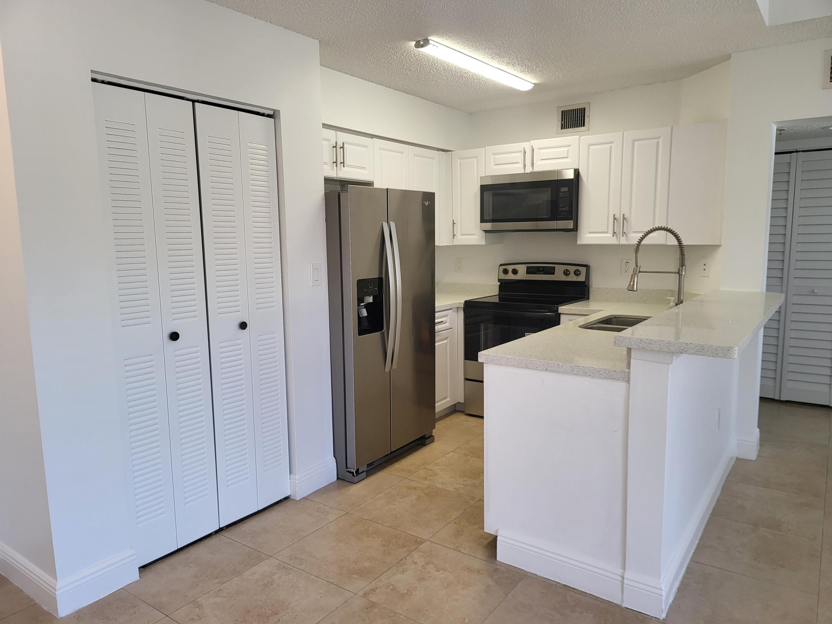 771 N Pine Island Road Unit 308 — photo