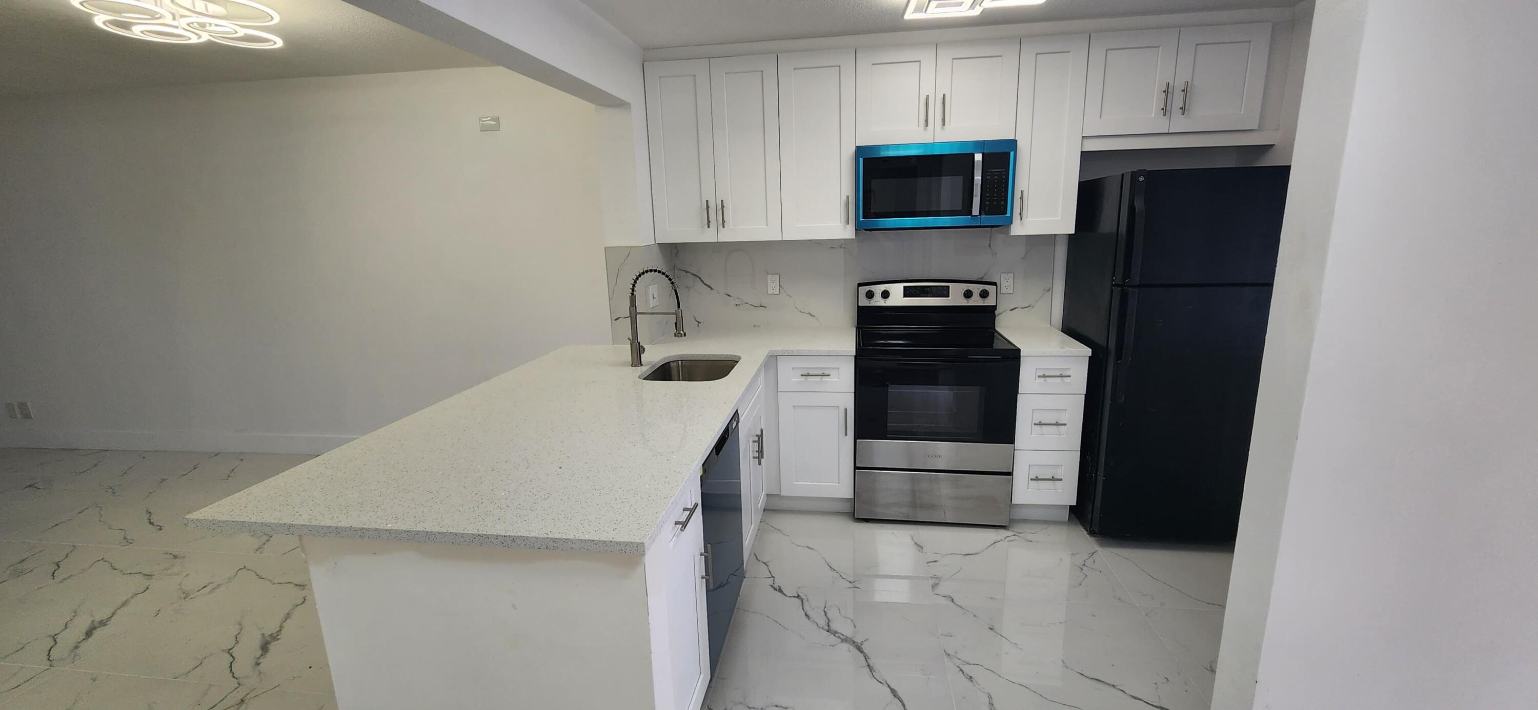 21938 Remsen Terrace Unit 101 — photo
