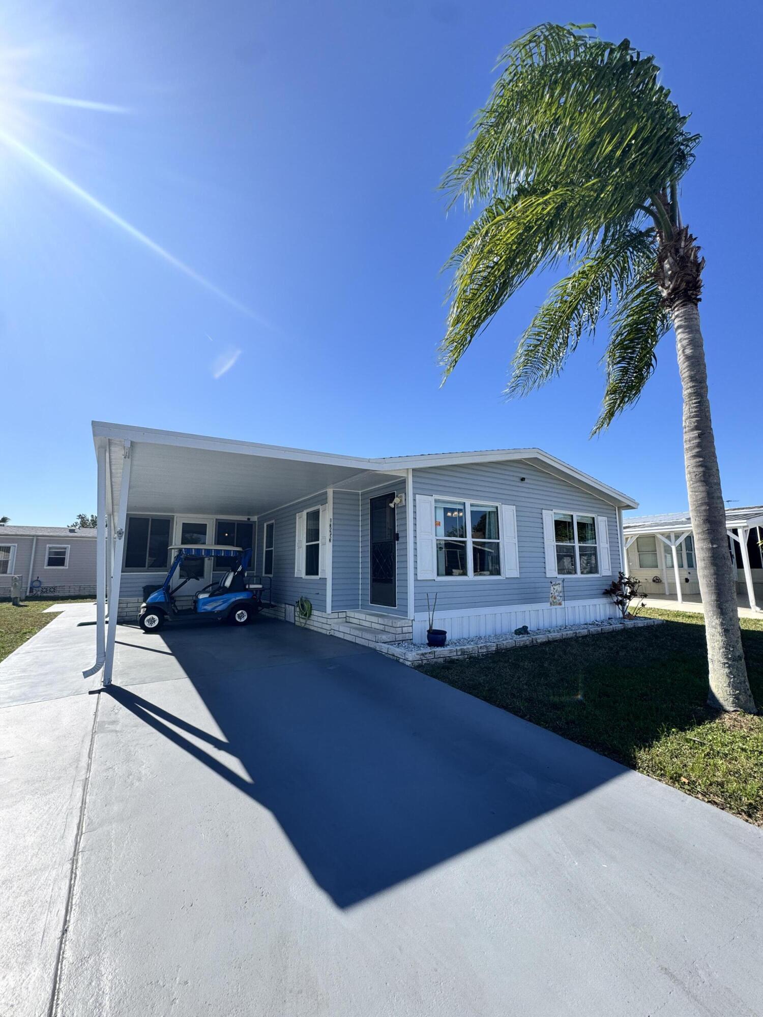 13953 Adelfa Avenue — photo