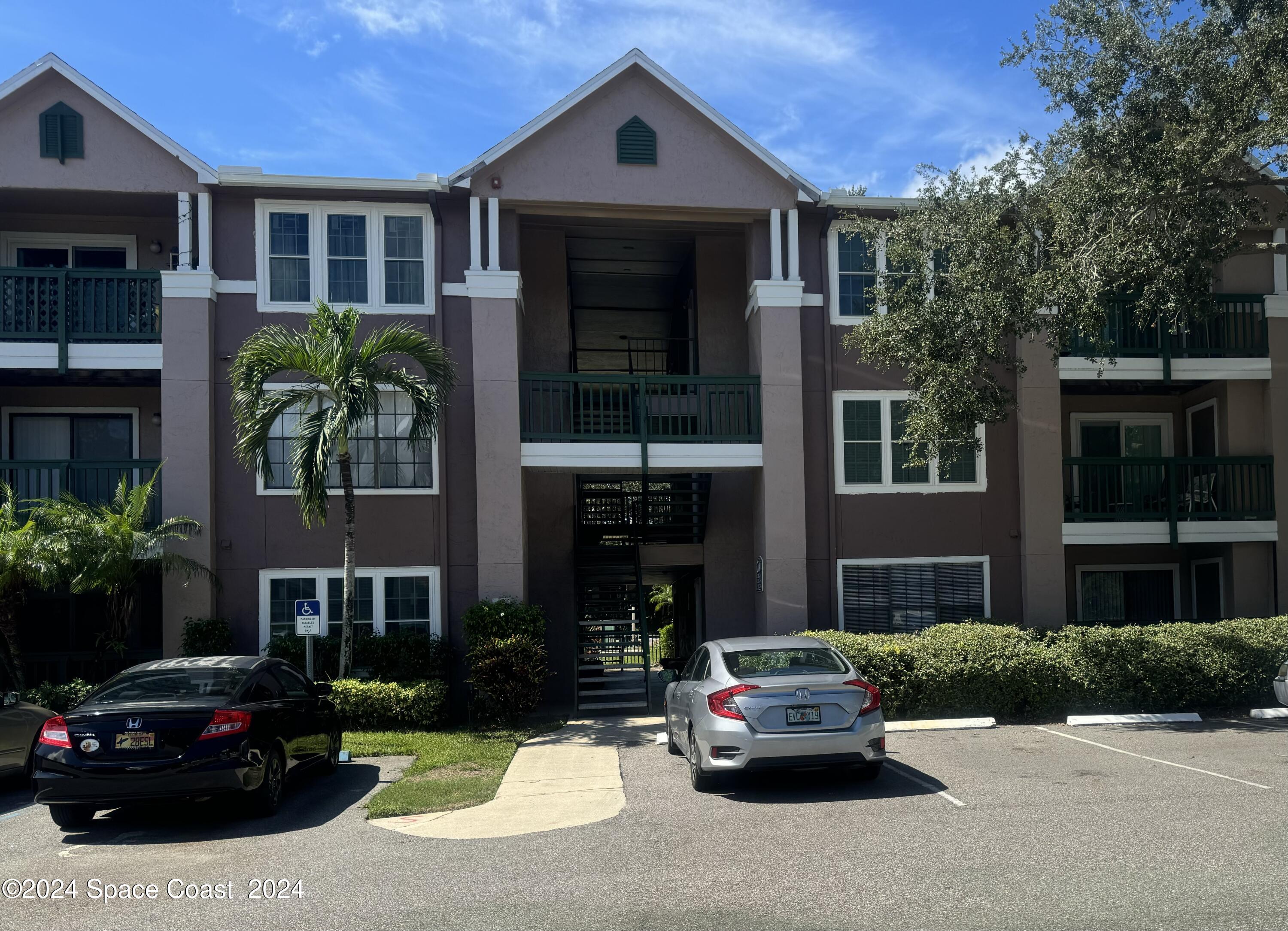 7667 N Wickham Road Unit 207 — photo
