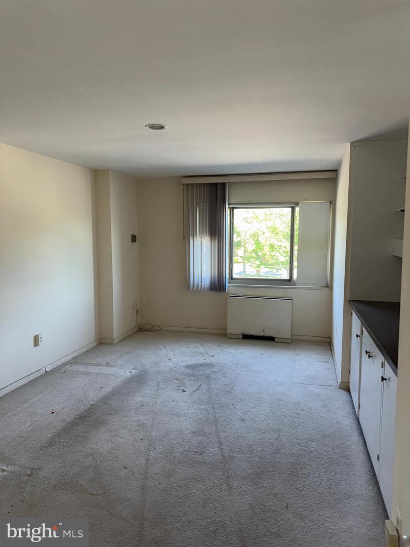 7121 Park Heights Ave #203 — photo