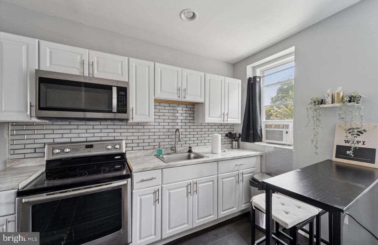 7018 Woodland Ave — photo