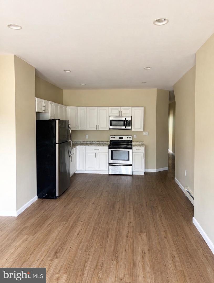 7018 Woodland Ave #1 — photo