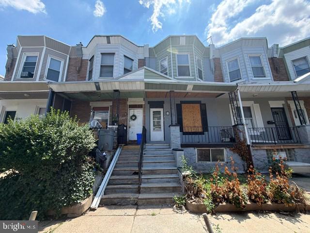 6146 Delancey St — photo
