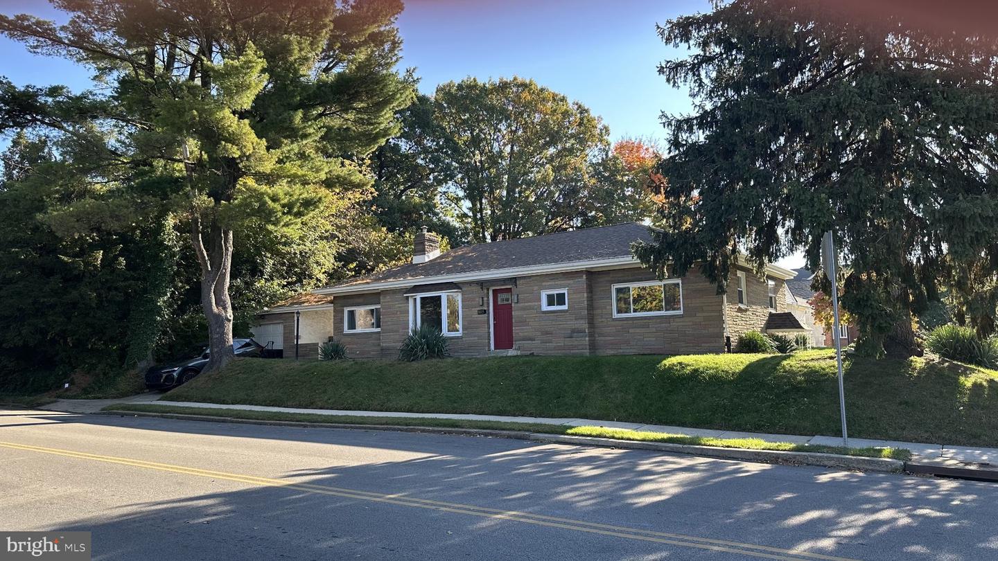 8015 Woolston Ave — photo