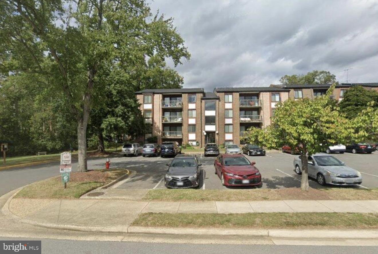 9733 Kings Crown Ct #201 — photo