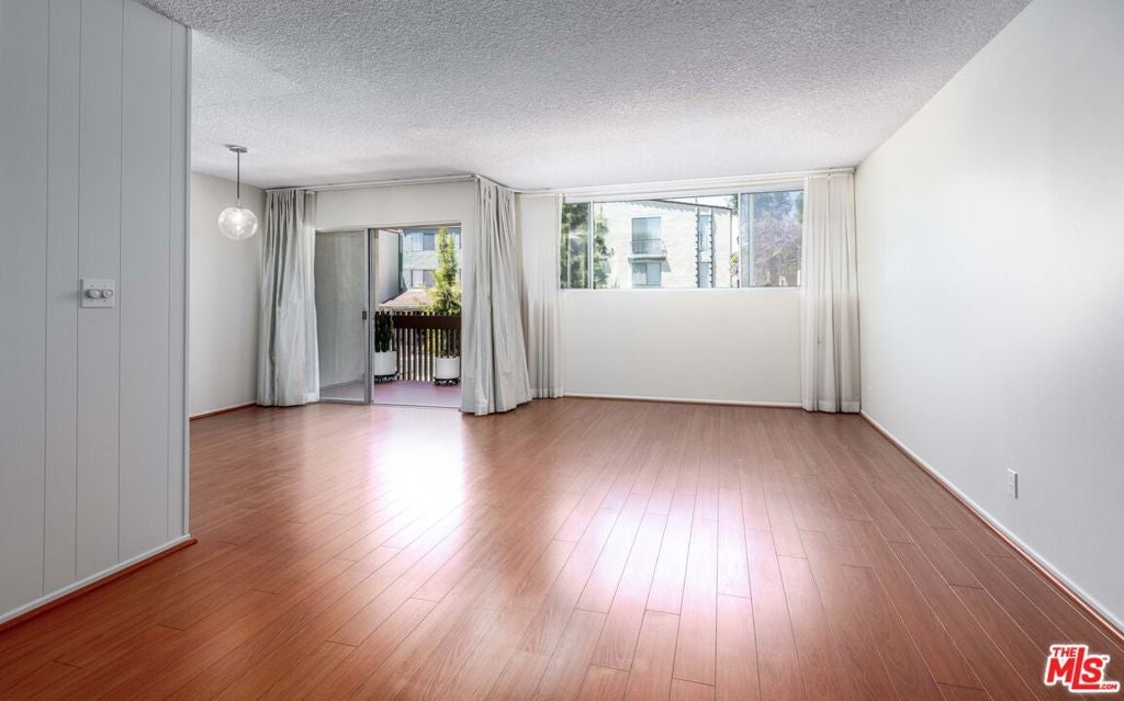 6050 Canterbury Drive E214 — photo