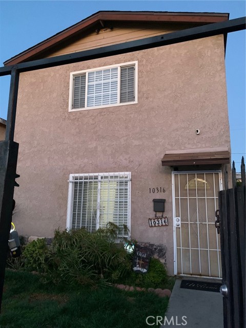 10316 S San Pedro St — photo