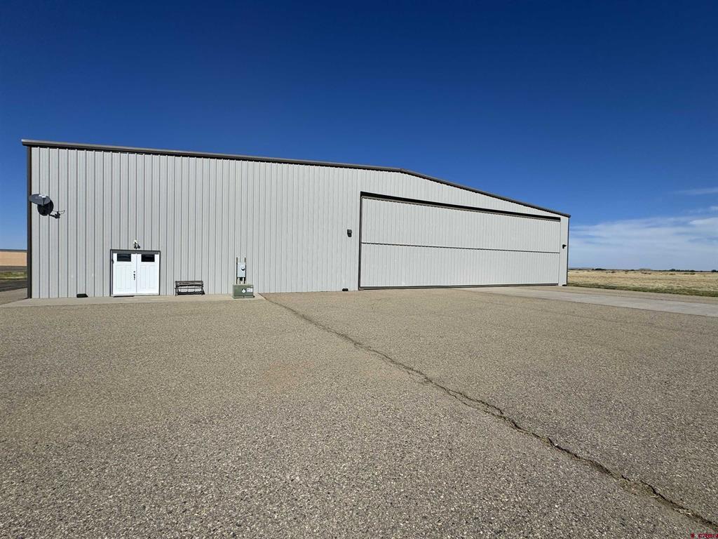 44897 CR 38 Perry Stokes Airport Hang — photo