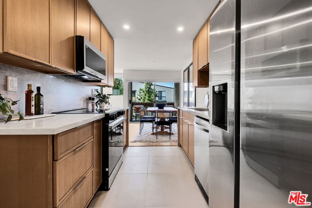 6050 Canterbury Drive Unit E313 — photo