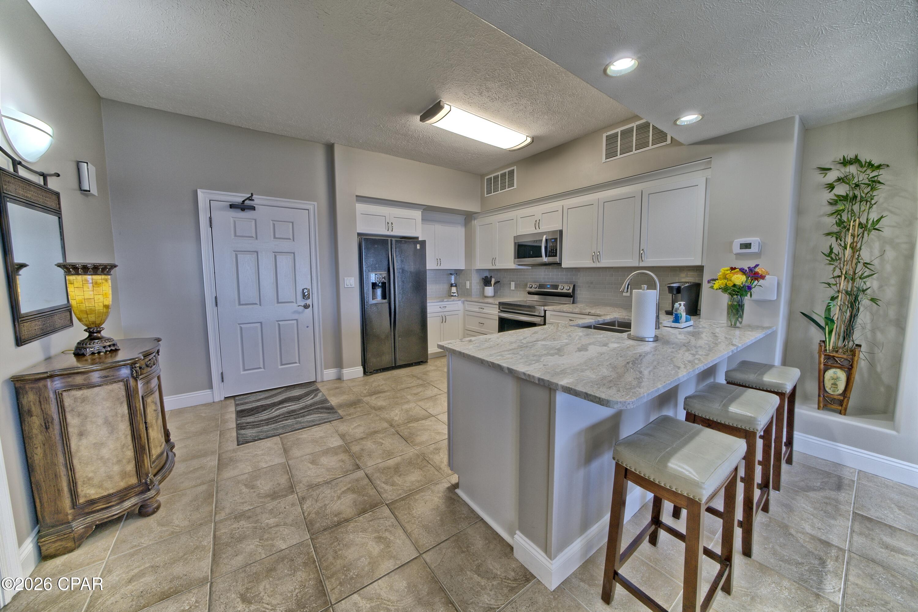 8715 Surf Drive 1702B — photo
