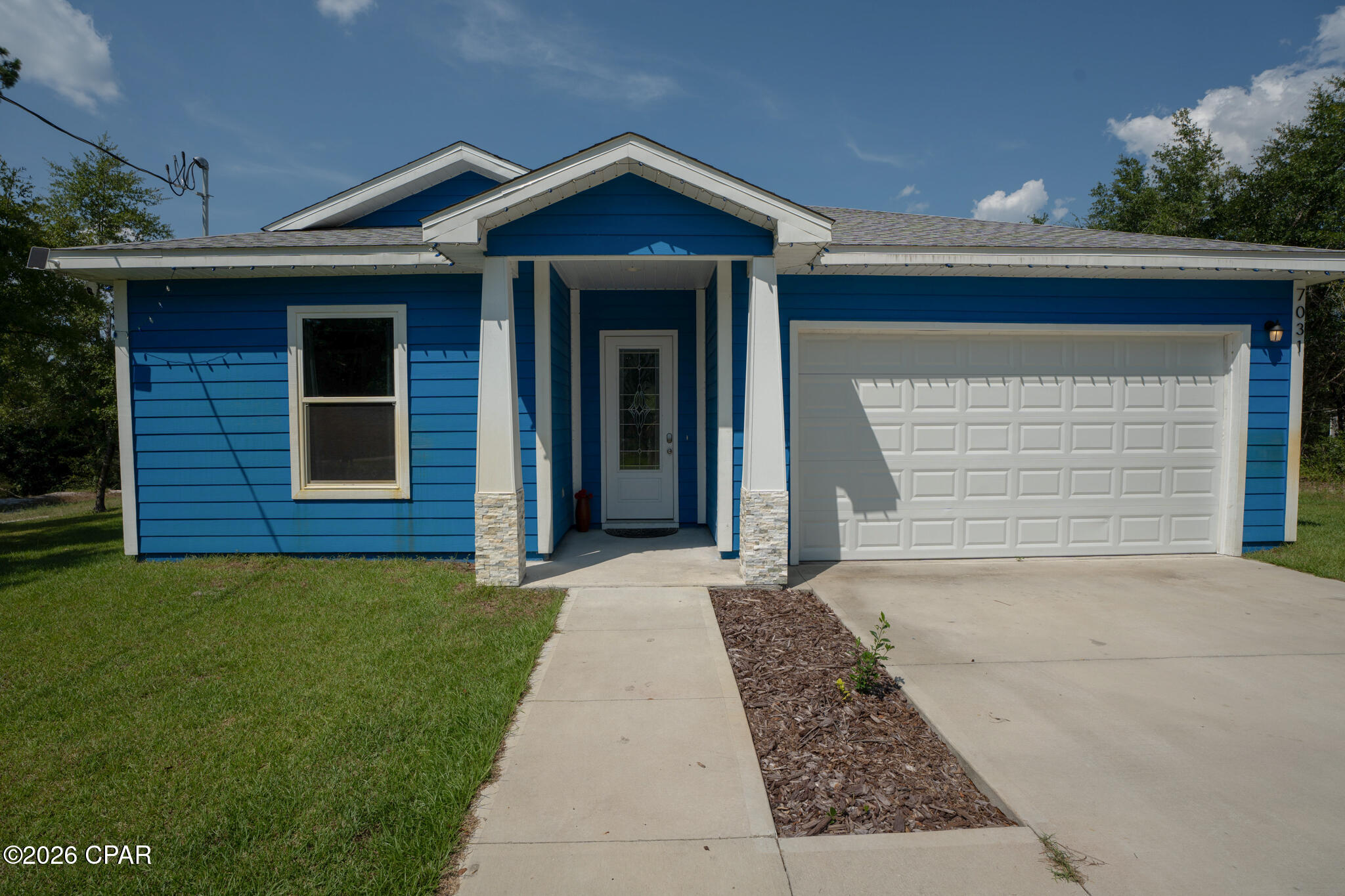 7031 Campflowers Road — photo