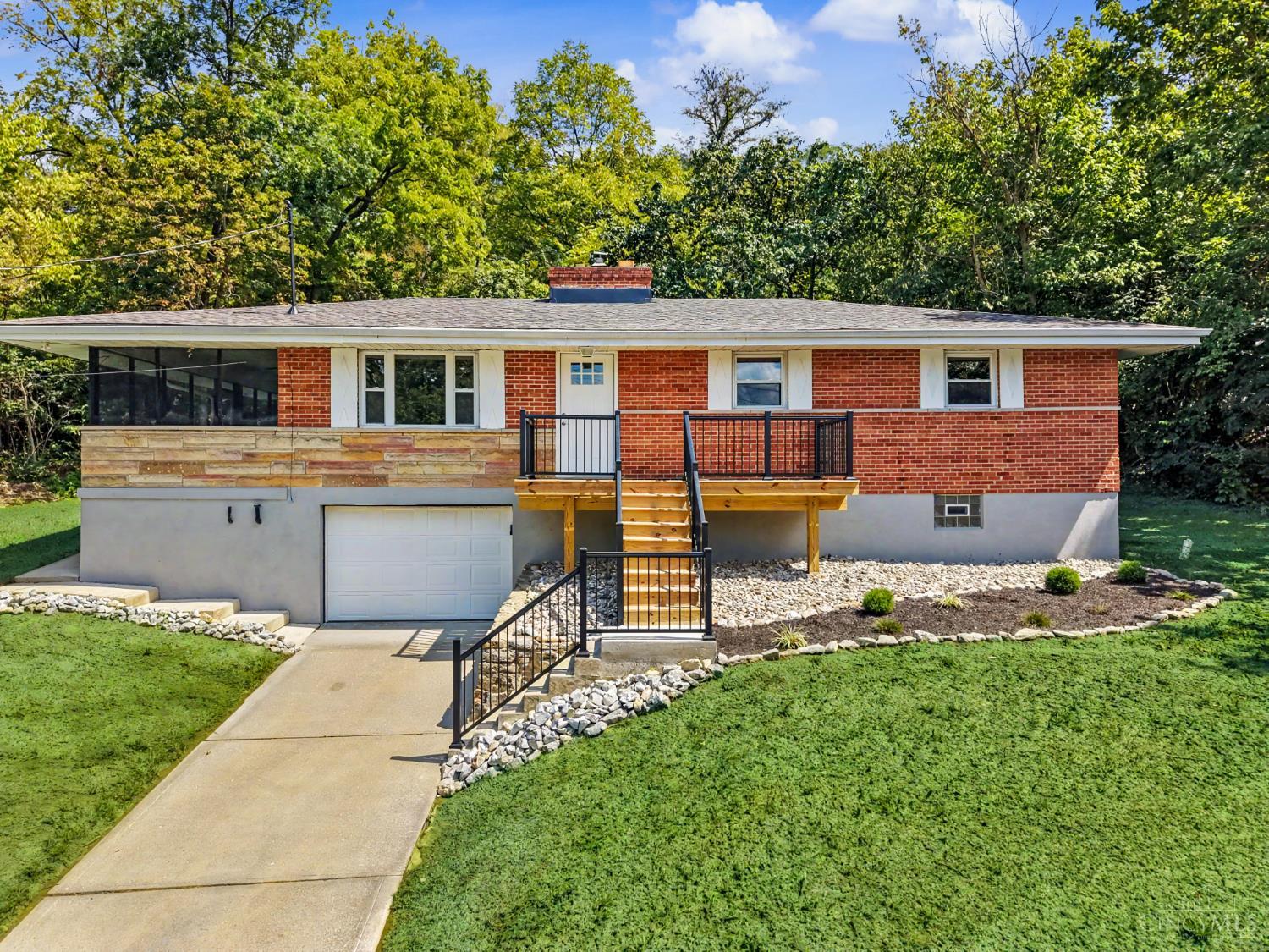 7458 E Miami River Road — photo