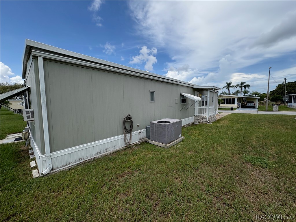 Home in Holiday, FL 34690 — photo 2