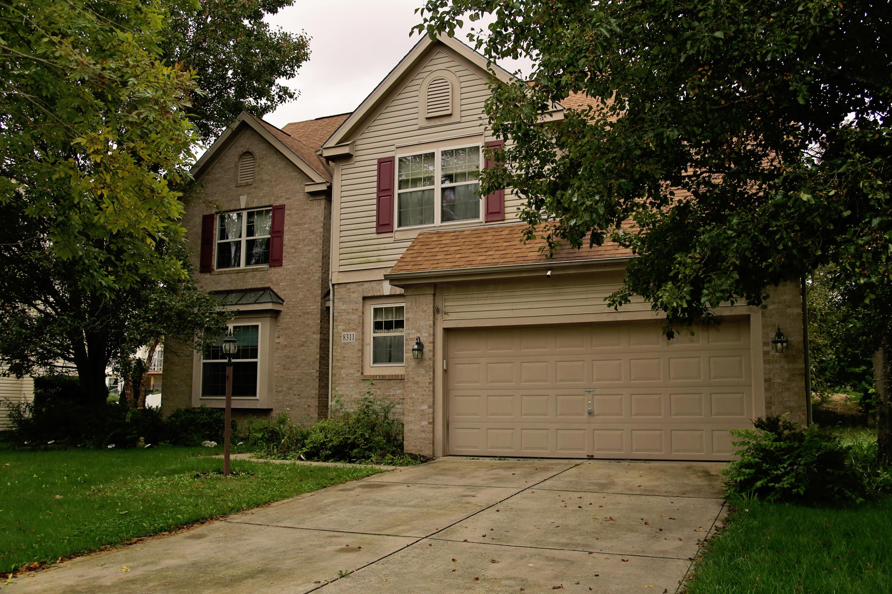8311 Woodstream Drive NW — photo