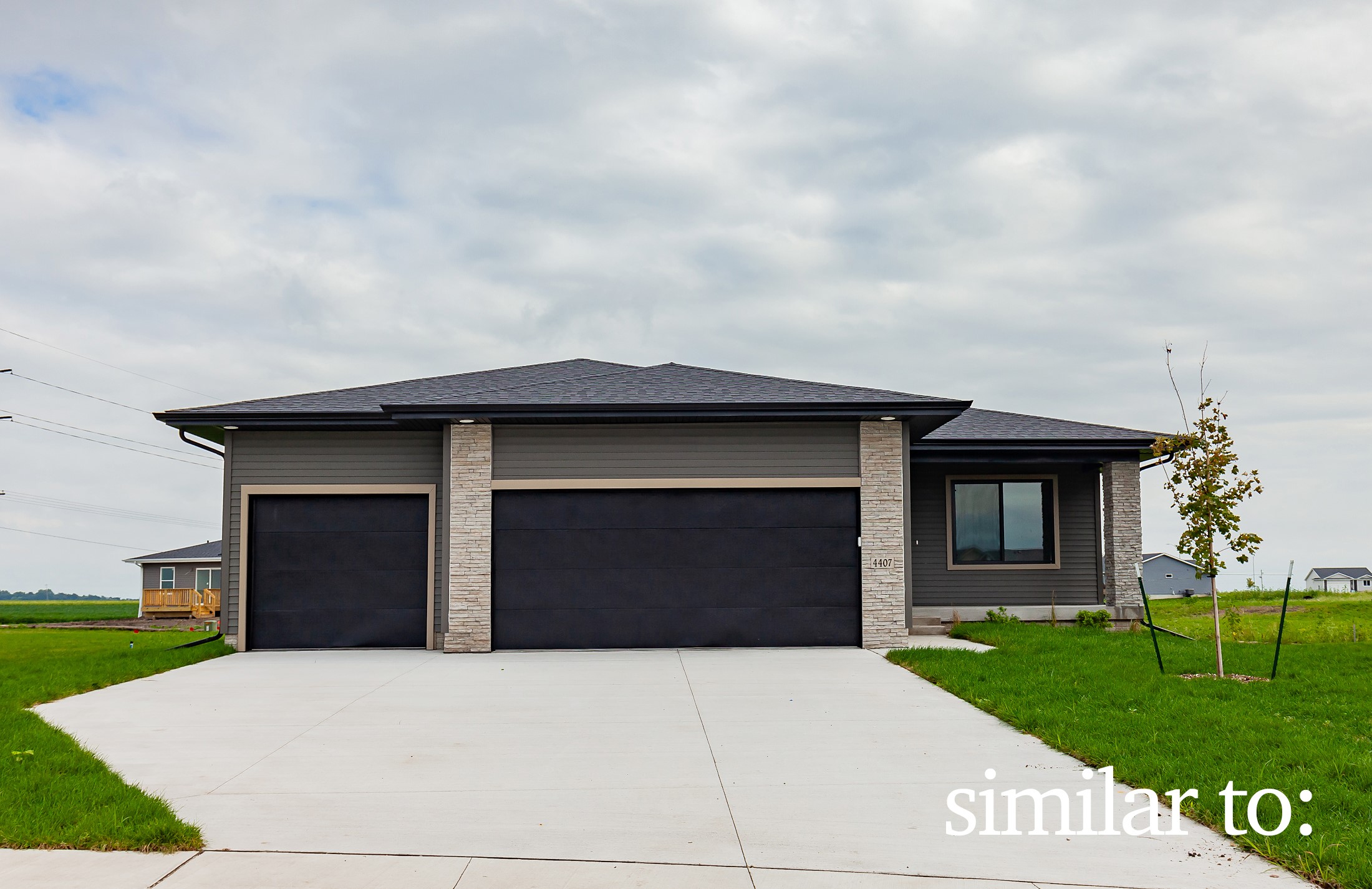 702 NE Crossing Oaks Drive — photo
