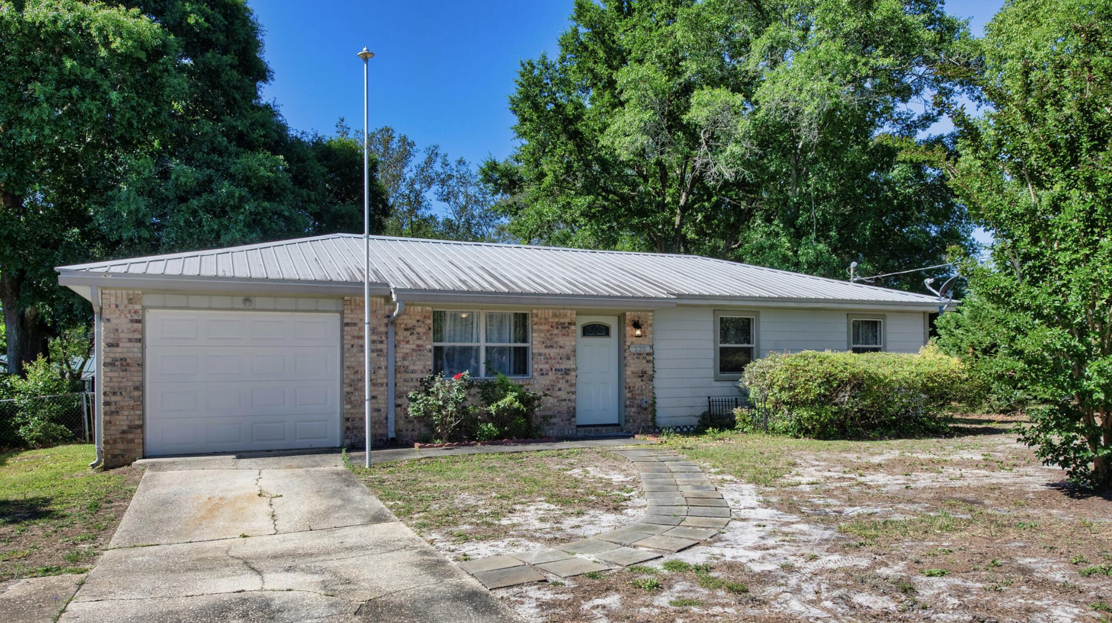 126 NW Watson Drive — photo