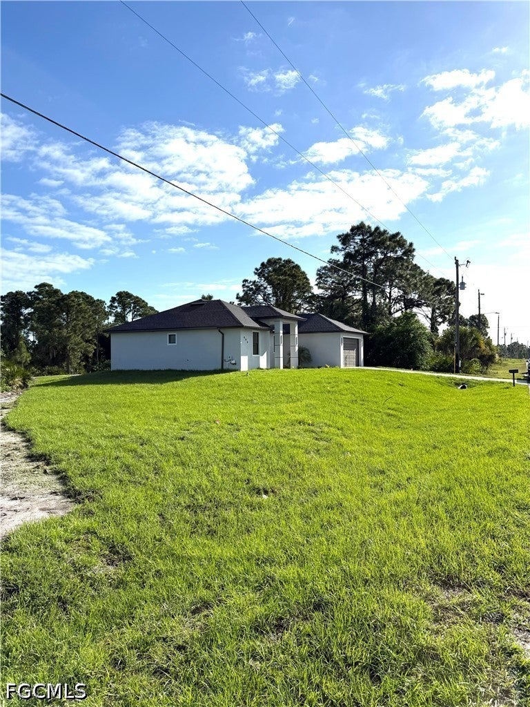 Home in Lehigh Acres, FL 33974 — photo 2