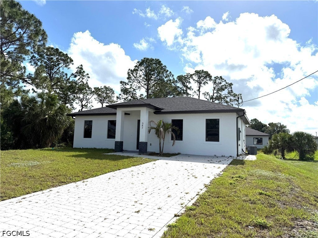 Home in Lehigh Acres, FL 33974 — photo 3