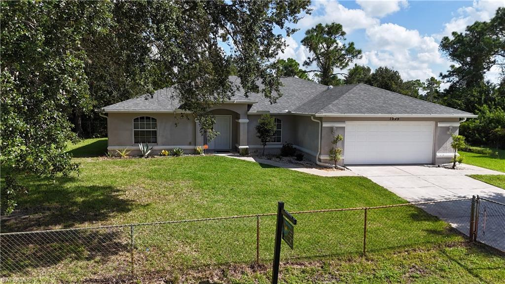 1025 Iris St E, Lehigh Acres, FL 33974