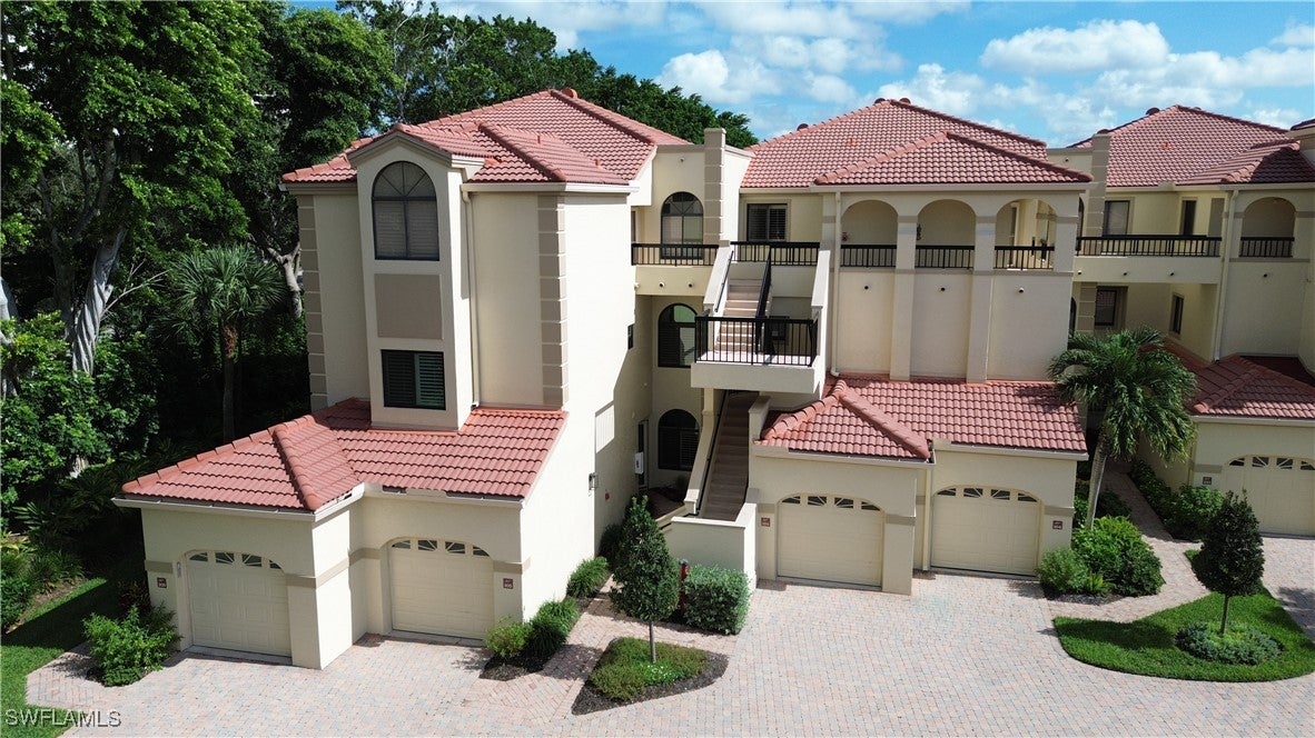 7048 Pelican Bay Boulevard C-105 — photo