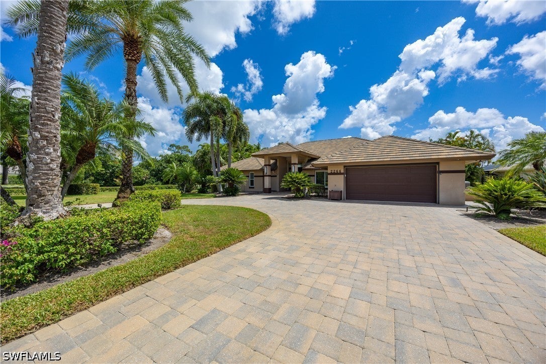Home in Naples, FL 34110 — photo 2