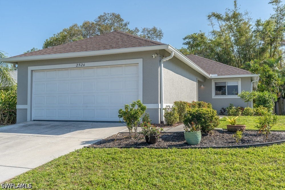 Home in Naples, FL 34112 — photo 2