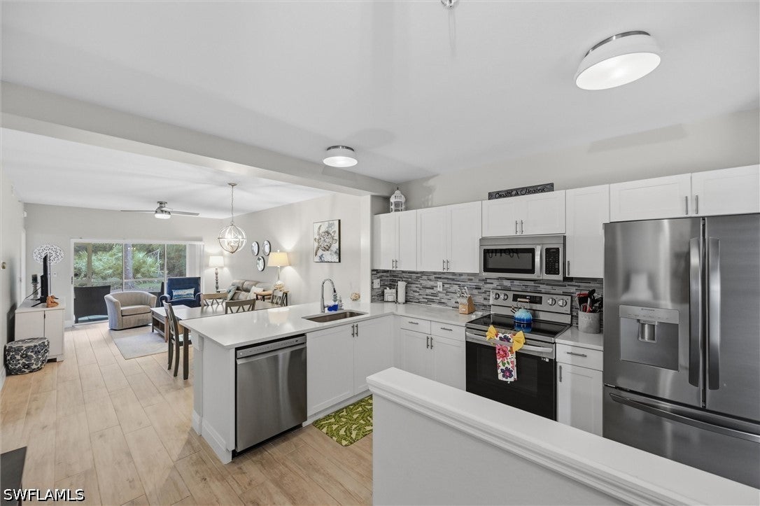 Home in Naples, FL 34113 — photo 2