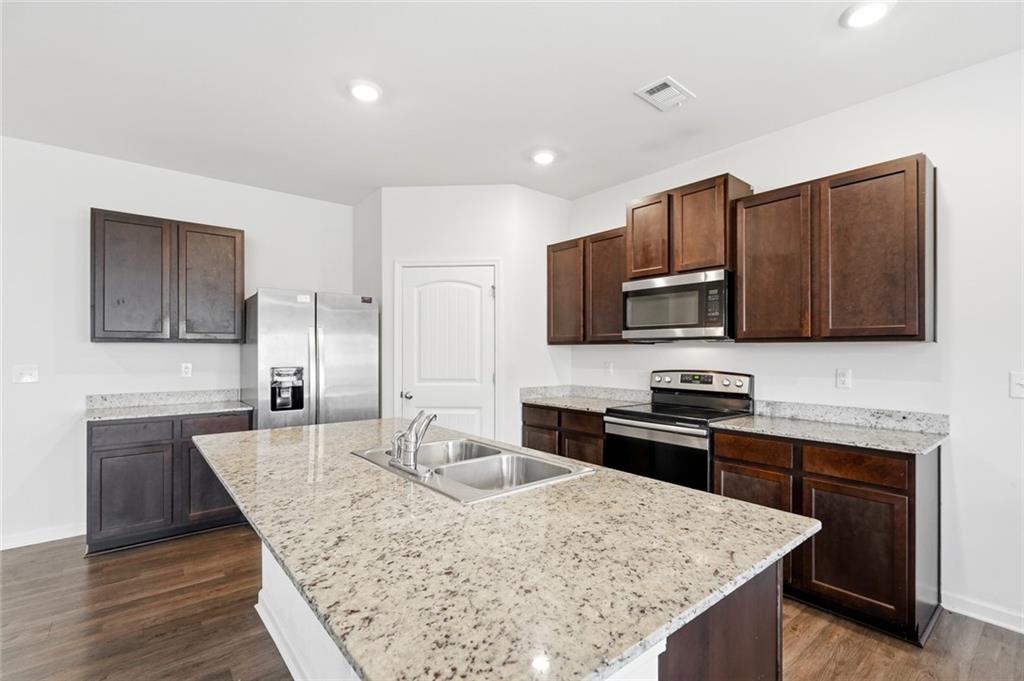 Home in Atlanta, GA 30349 — photo 3