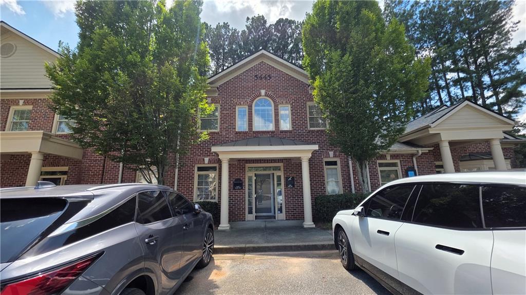 5445 McGinnis Village Place Unit 205 — photo