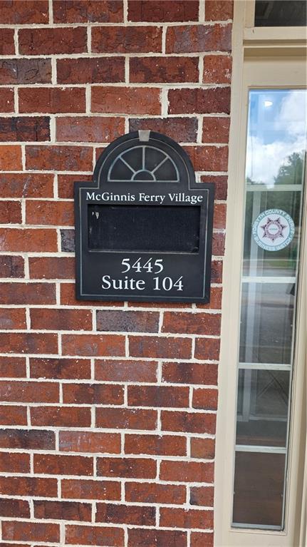5445 McGinnis Village Place Unit 104 — photo