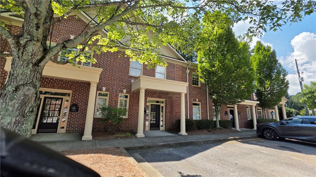 5445 McGinnis Village Place Unit 105 — photo
