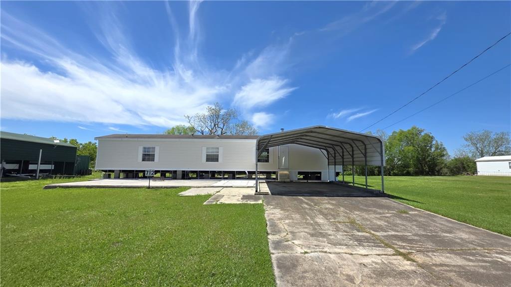 712 Buras River Road — photo
