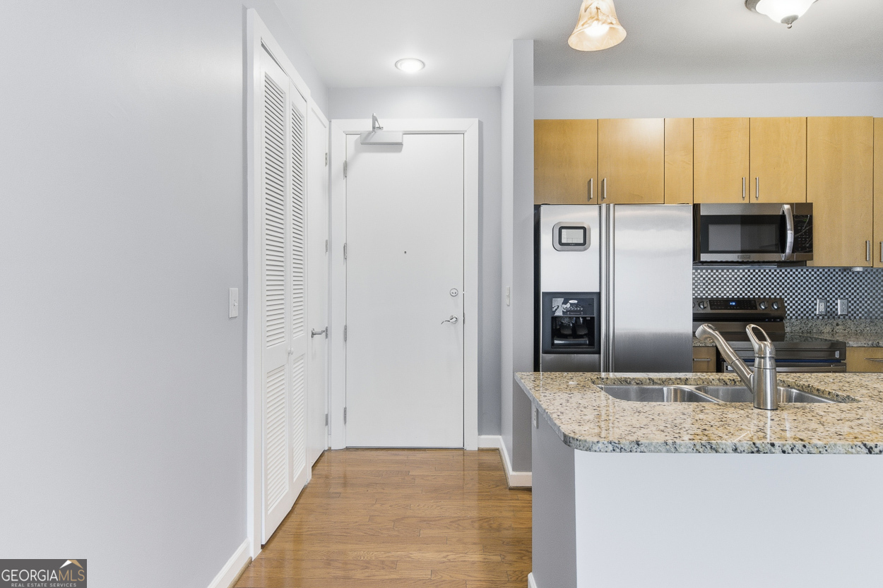 711 Cosmopolitan Dr NE 213 — photo