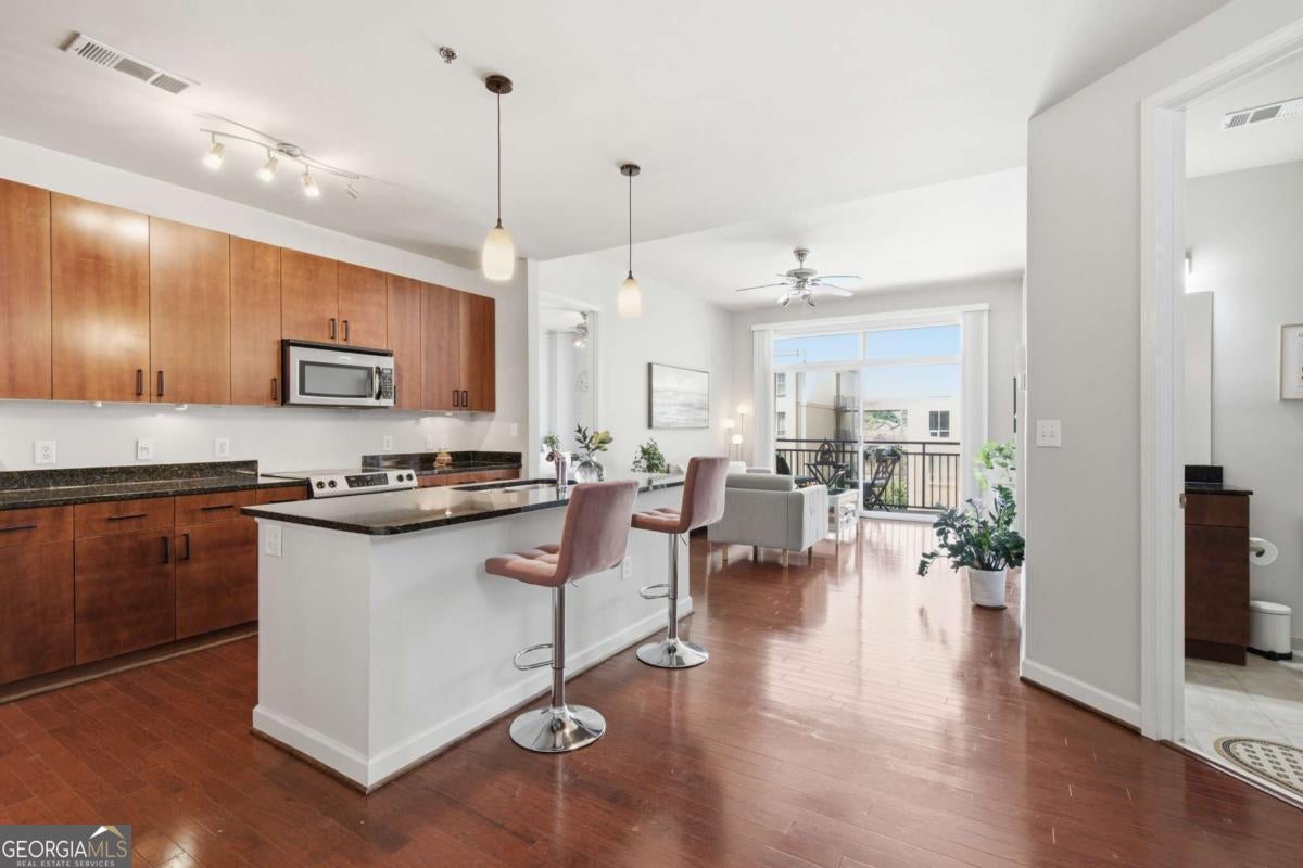 711 Cosmopolitan Dr NE 326 — photo