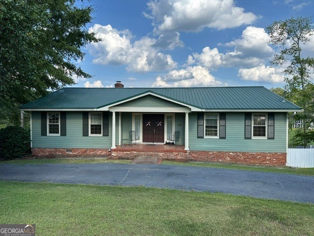 135 NE Chumley Rd NE — photo