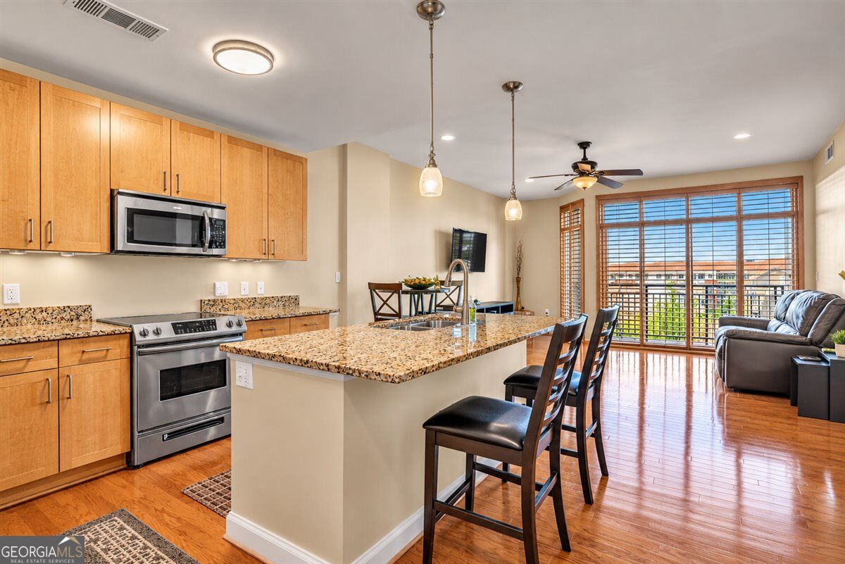 711 Cosmopolitan Dr NE 403 — photo