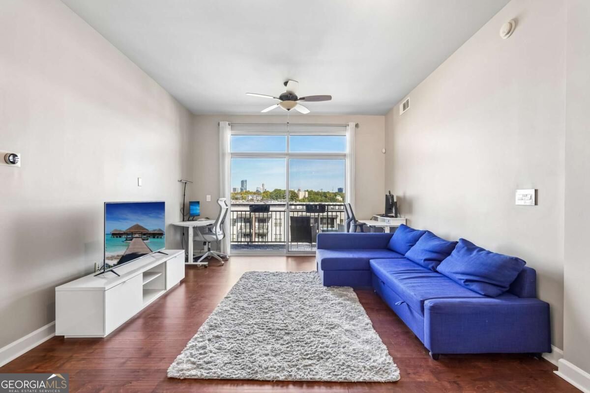 711 Cosmopolitan Dr NE Unit 711 — photo