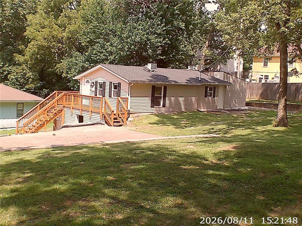 11406 E 10th Street S — photo